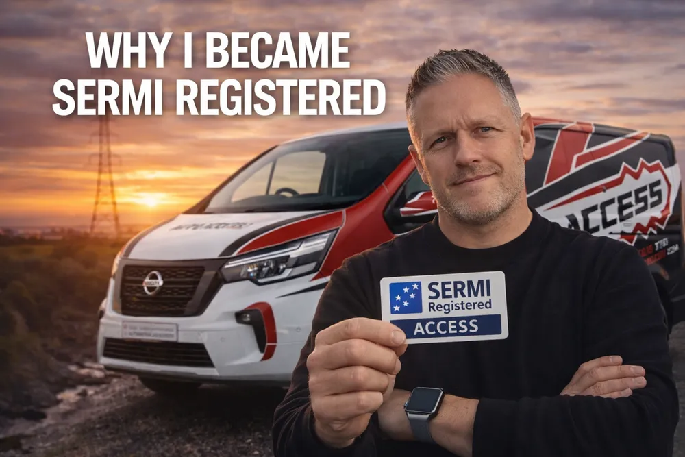 Kevin from Auto Access holding SERMI registration card in front of his locksmith van